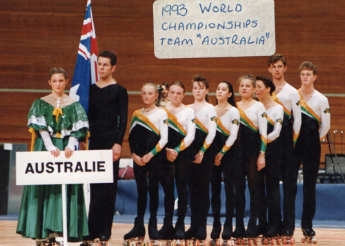 Amanda & Tammy Bryant representing Australia at the 1993 Artistic World Championships in France, behind flag bearer Jayson Sutcliffe